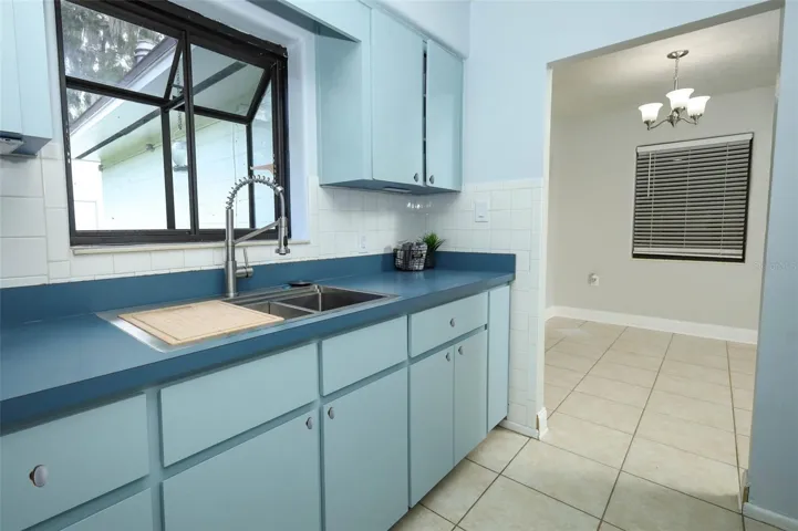 Kitchen with Window Box and Dining Room