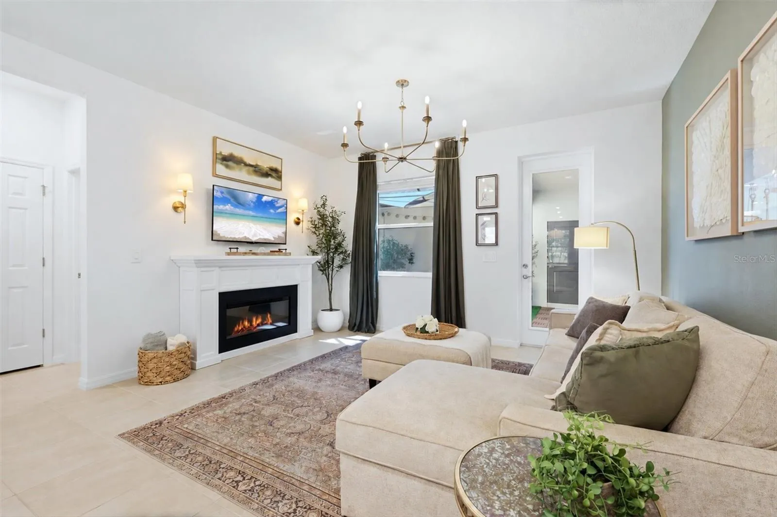 Great room with access to the lanai and courtyard.
