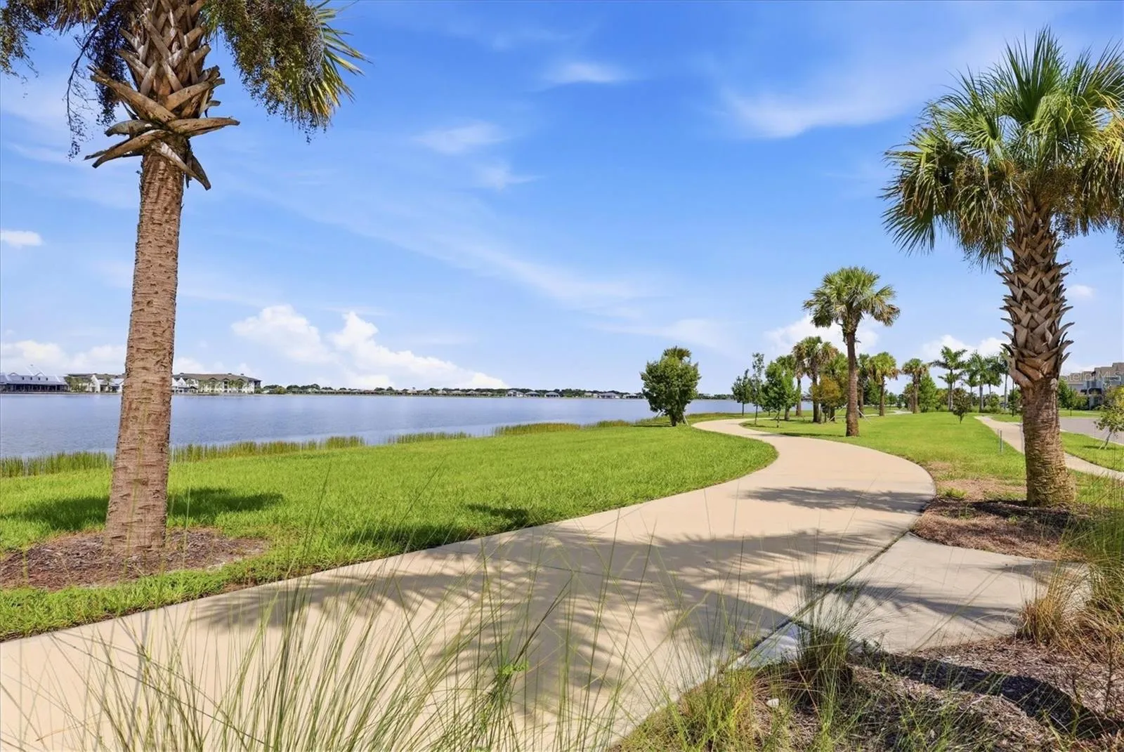 Walking trail around Kingfisher Lake, steps from Waterside Place