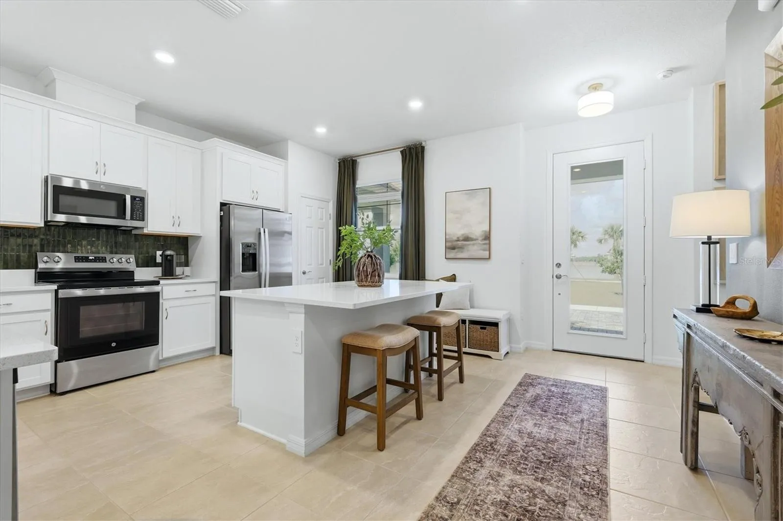 Stainless steel appliances, quartz counters