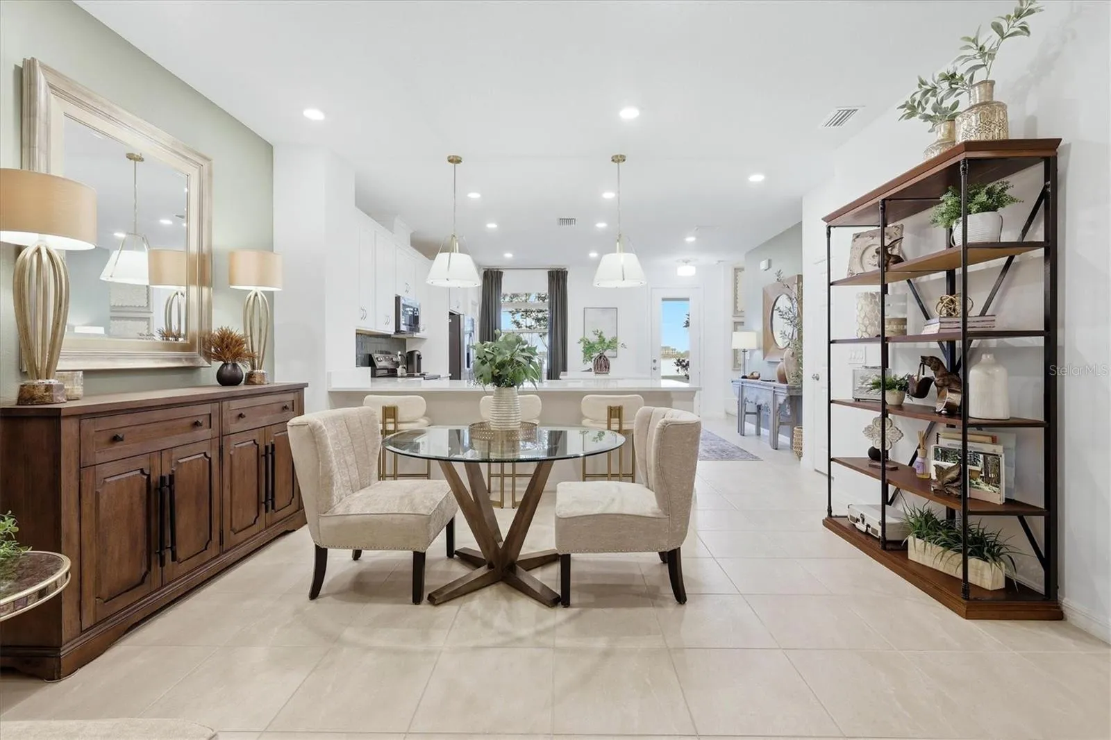 Dining area in addition to seating at the breakfast bar and island