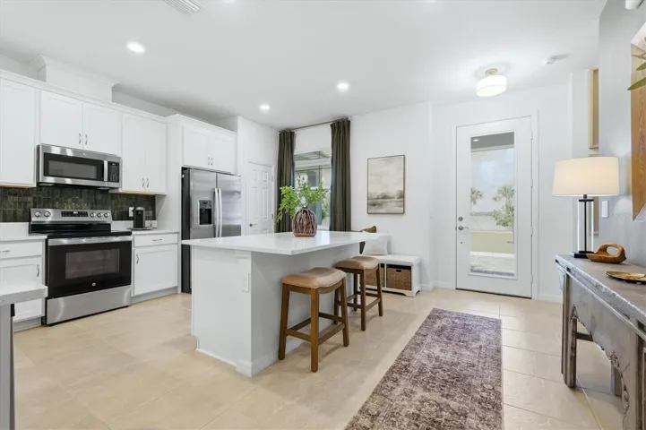Stainless steel appliances, quartz counters