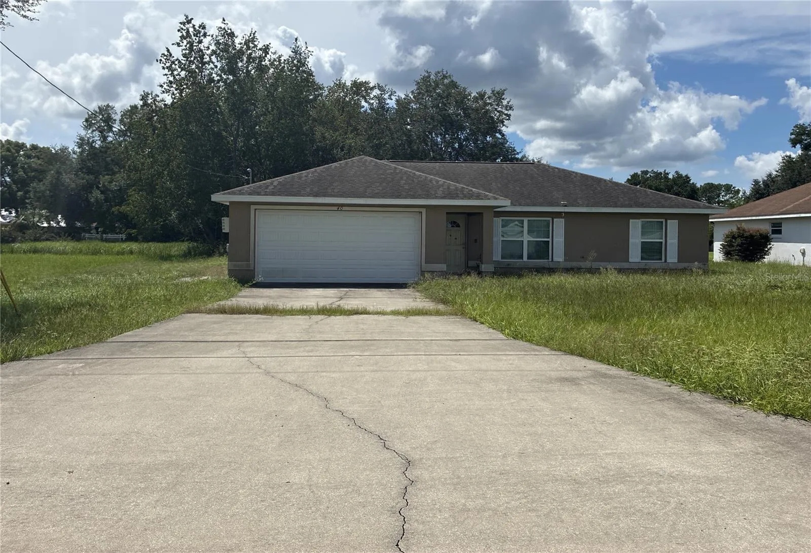 Front exterior and driveway - September 15, 2026