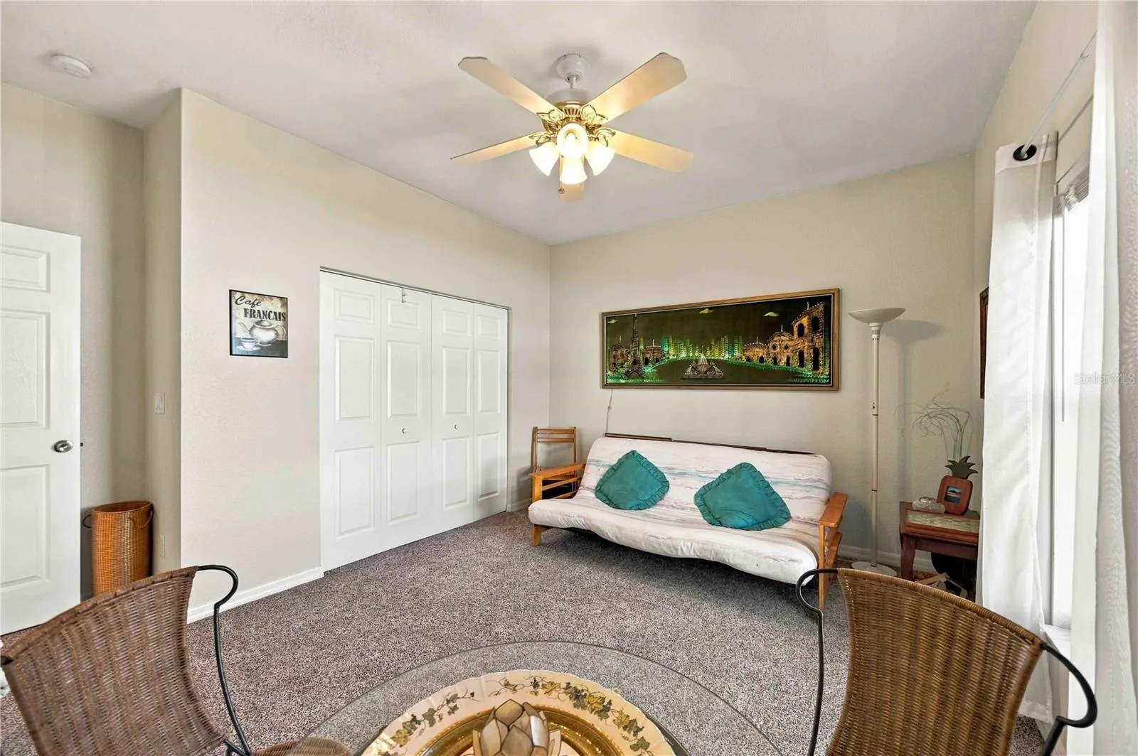 This bedroom has an abundance of natural light, offering a bright and airy atmosphere.
