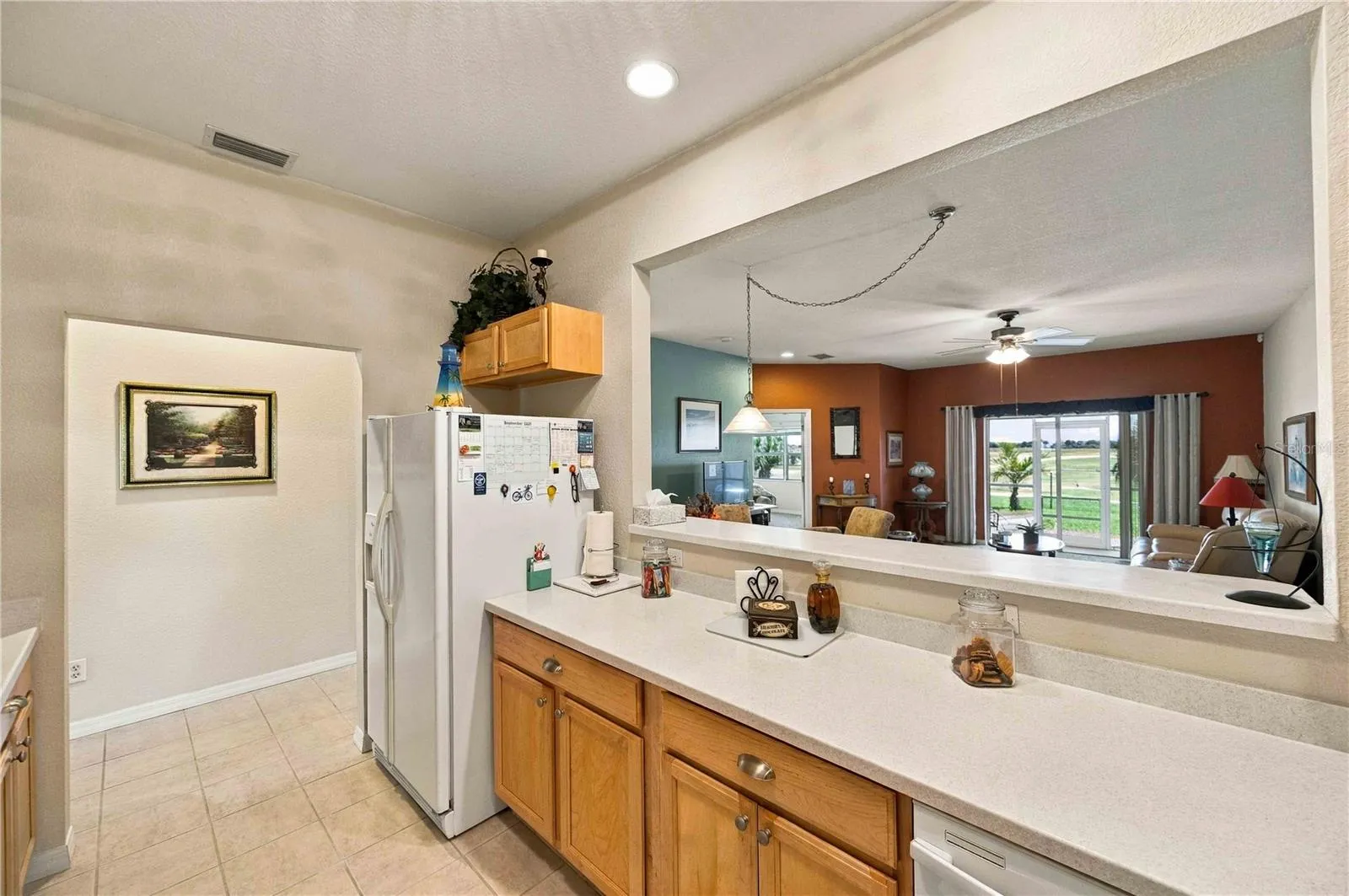 Kitchen view featuring a convenient pass-through to the dining area.