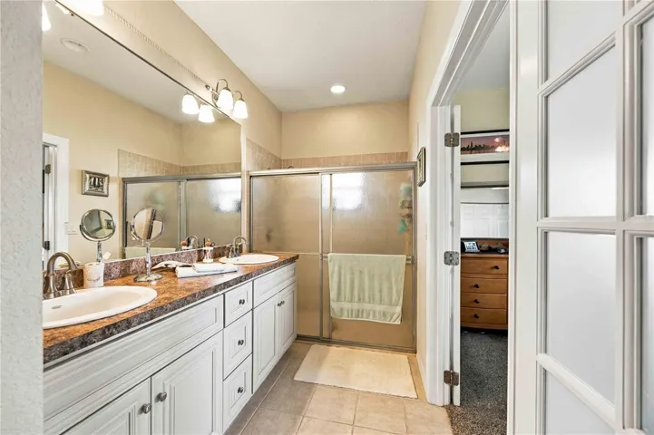 Spacious primary suite featuring ample natural light.