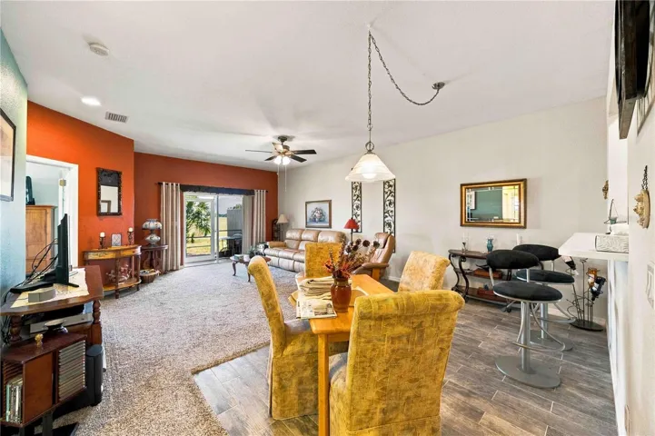 Bright, open-concept living area with ample natural light, perfect for both relaxing and entertaining.