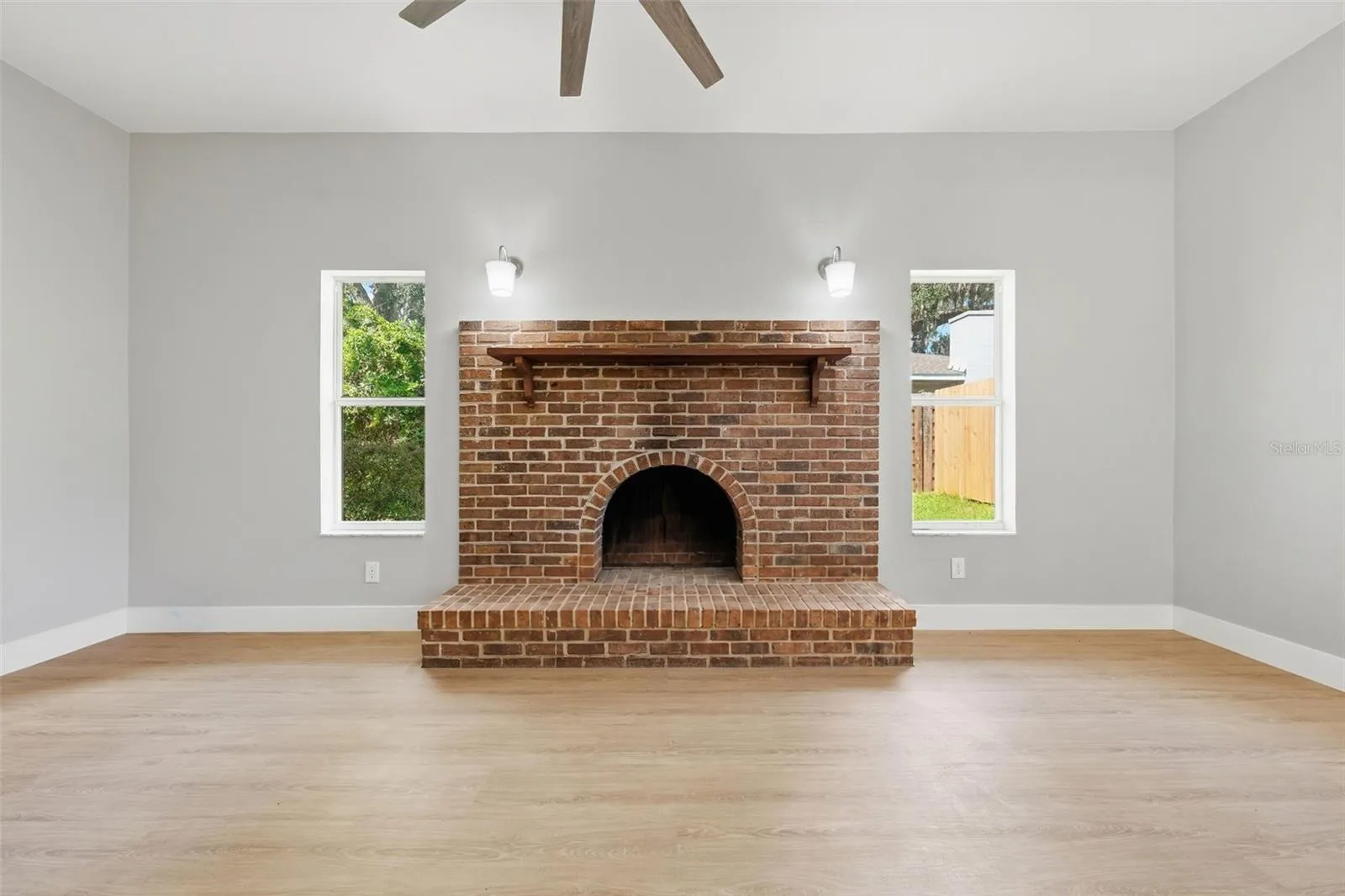 Family room with a brick fireplace