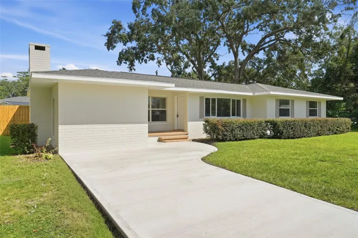 Fully renovated brick home with a new roof, fresh exterior paint and a new driveway