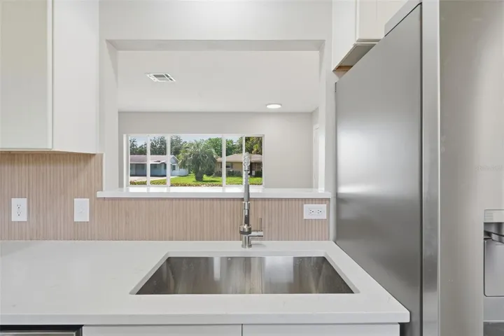 Stainless sink under the pass-through window