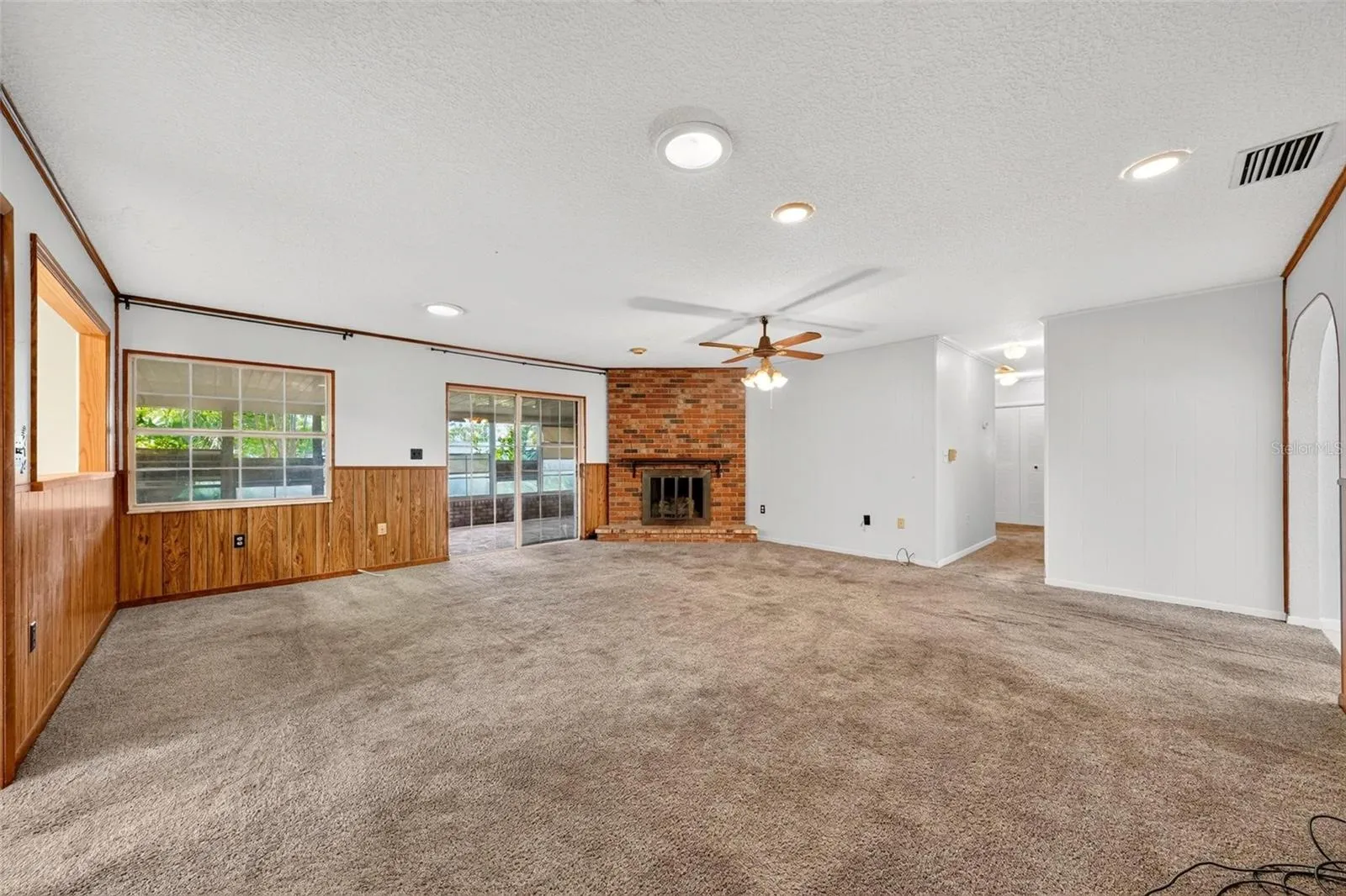 Family Room with Brick Fireplace