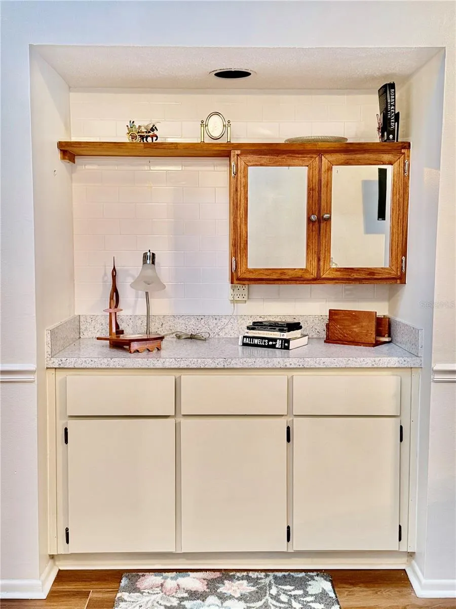 Dry near but water still underneath so could be converted back to wet bar
