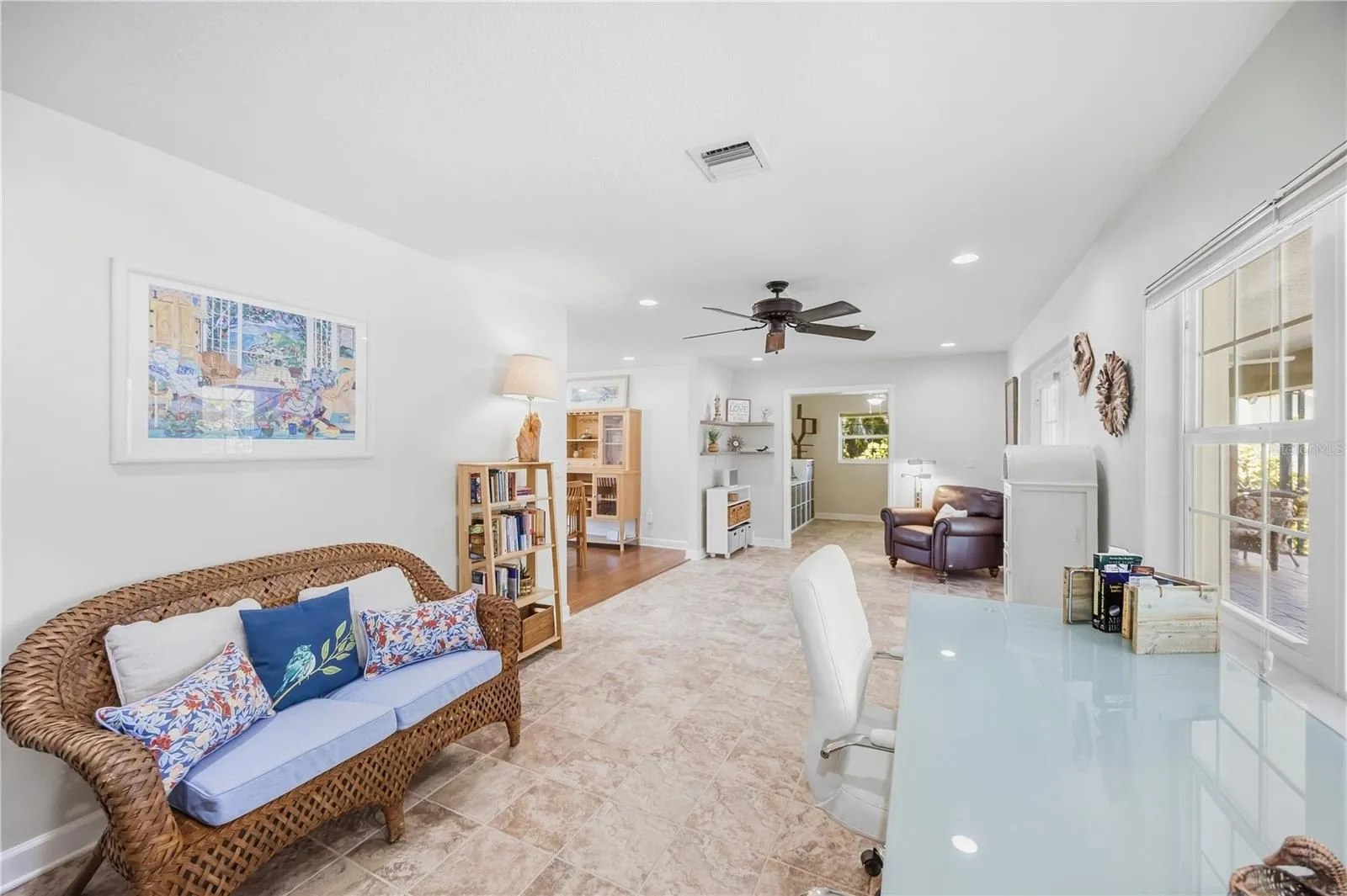 Much additional space with an office and a bonus room/study, b9oth of which lead out to the lanai/pool