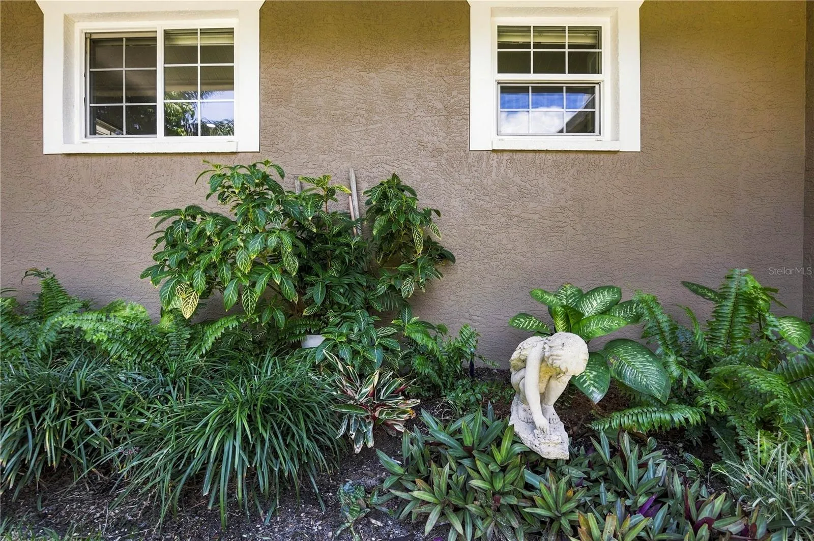 Gorgeous garden located underneath the guest bedroom and bathroom windows
