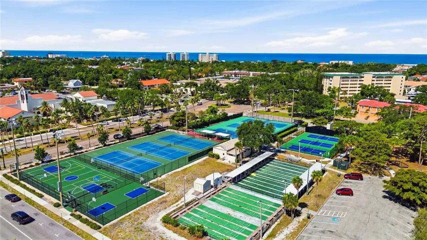 Pickle ball, Tennis, Basketball, Shuffleboard, and a kids Playground make up this public rec area