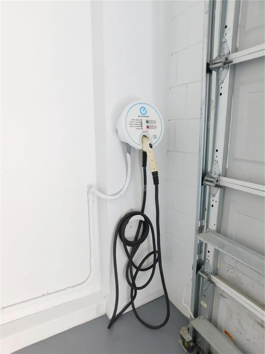 Electric vehicle charging station included
