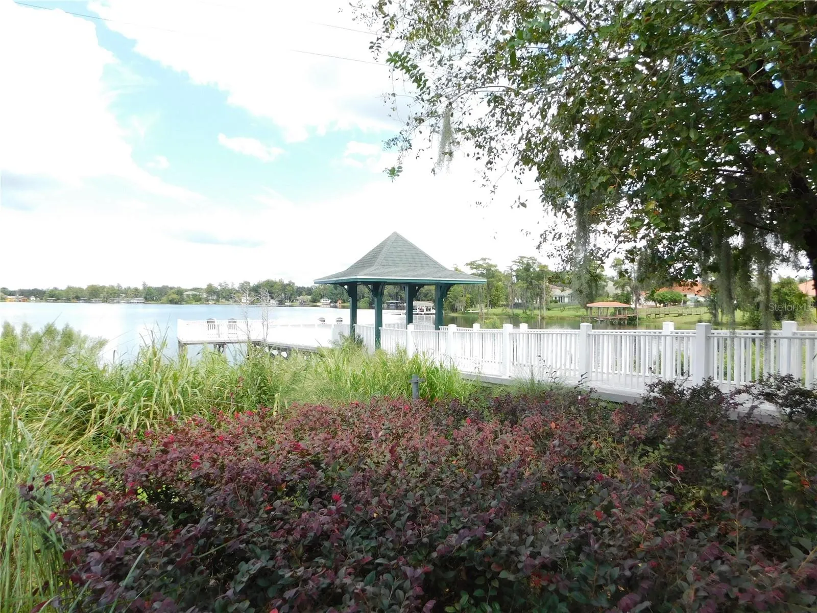Fishing pier on a beautiful community lake with conservation