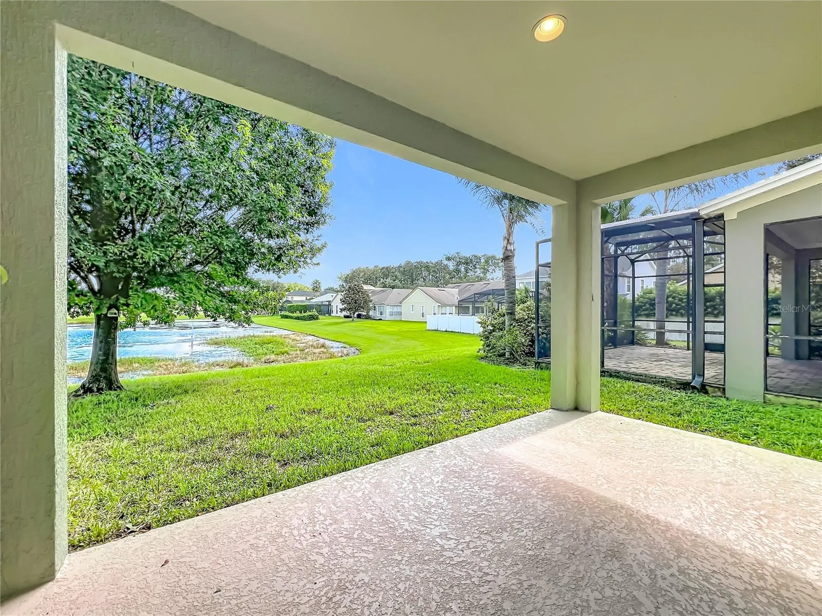 Covered Rear porch with pond view