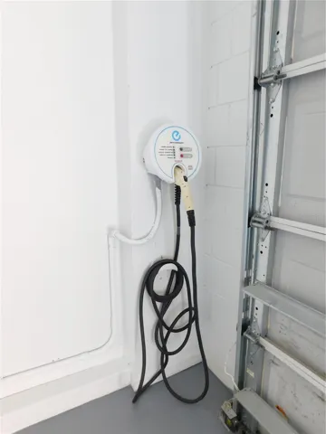Electric vehicle charging station included