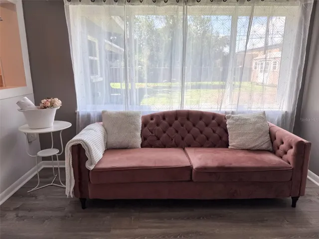 Large Window Overlooking Backyard