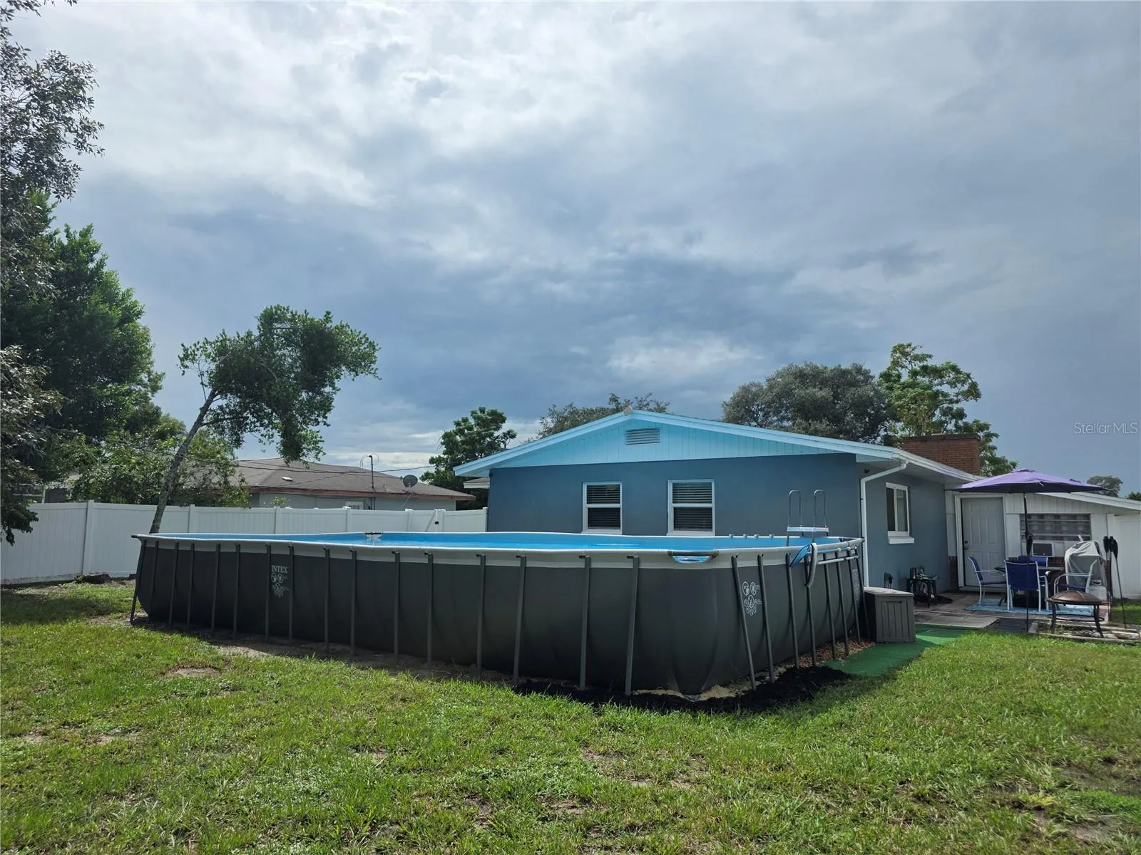 It comes with pool equipment, storage box and ladder