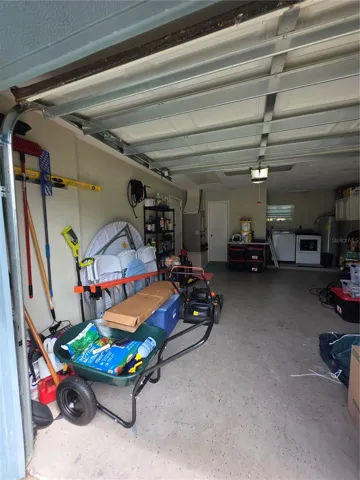 Plumbing for washer and dryer in the garage, (Appliances not included)