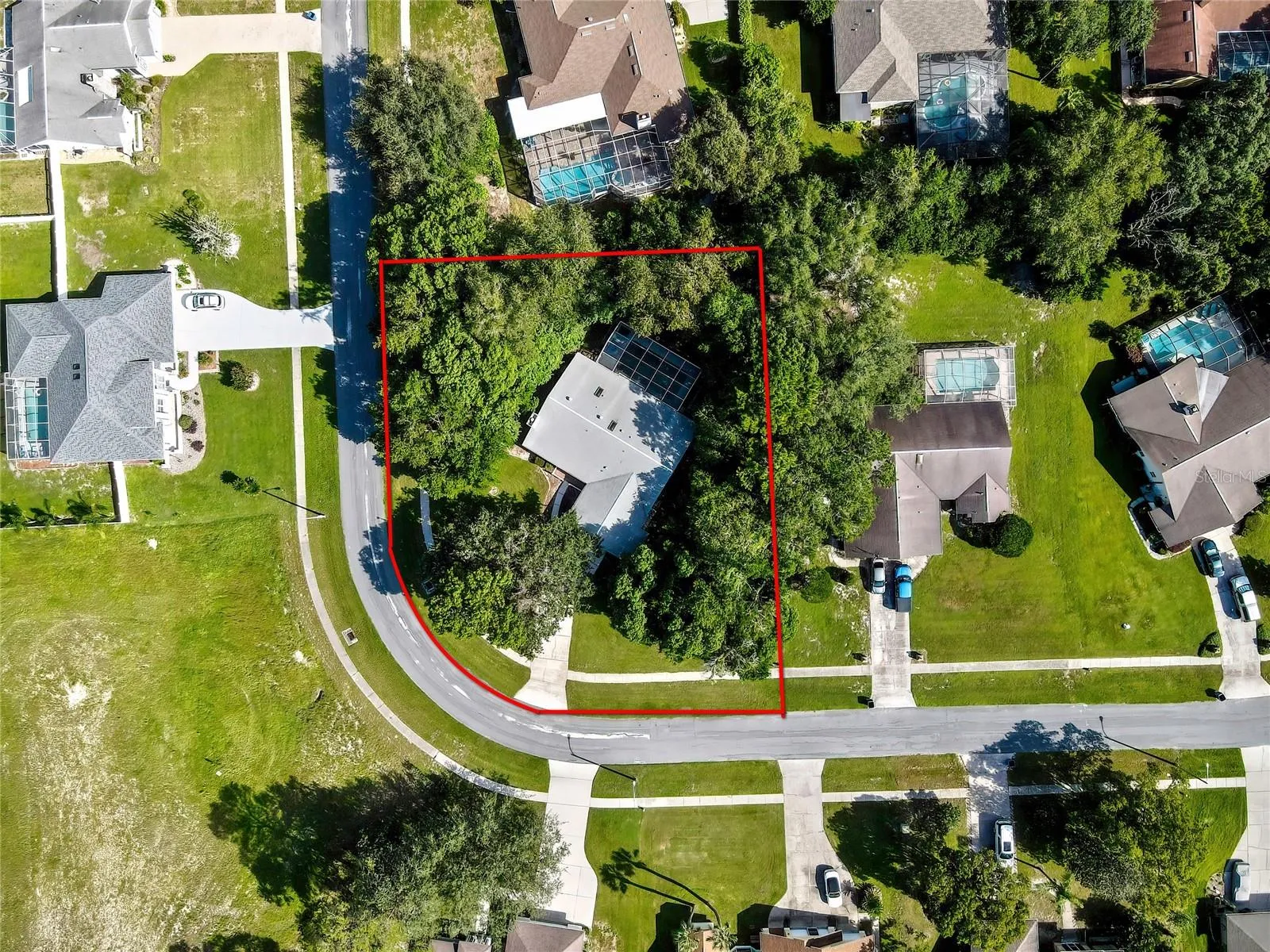 Overhead aerial with approximate property boundary shown