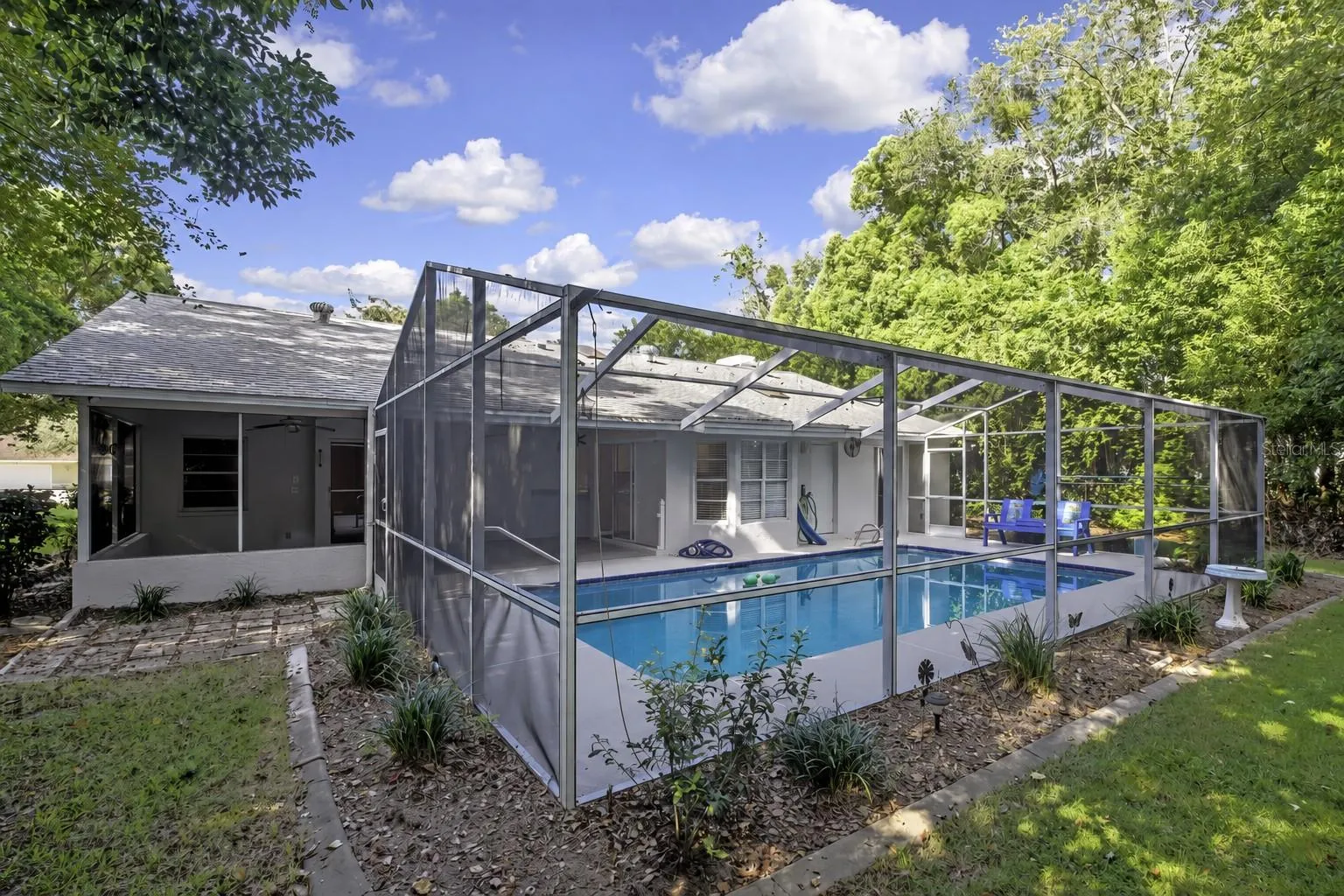 Elevated front view of the home and driveway