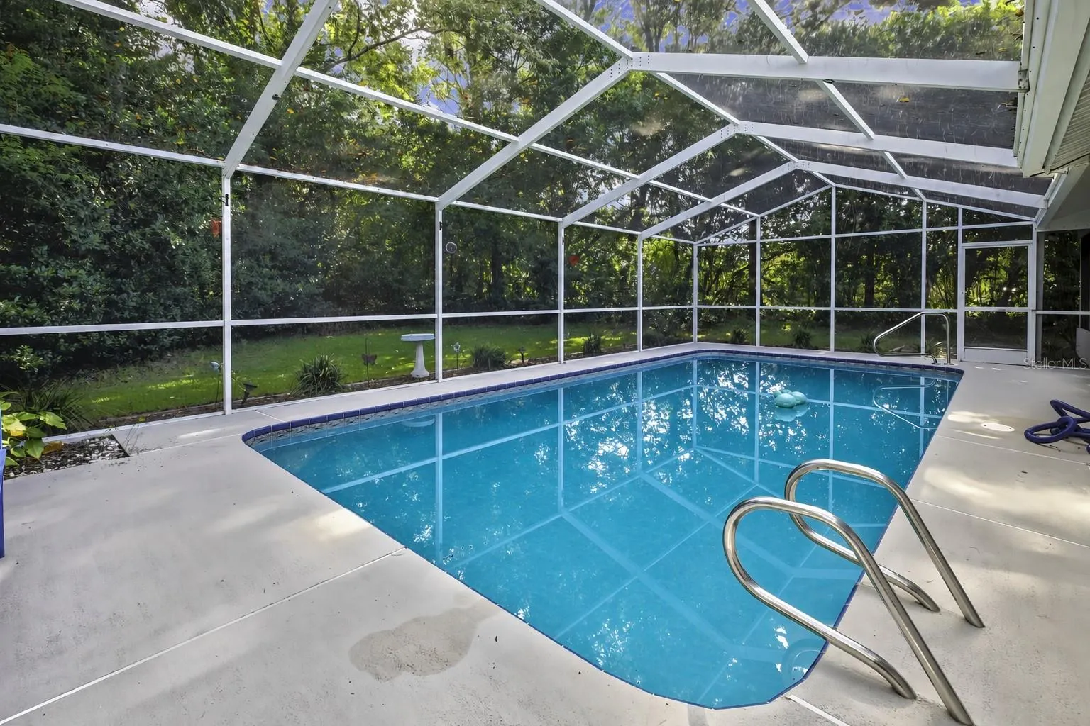 Spacious screened lanai for year-round outdoor living