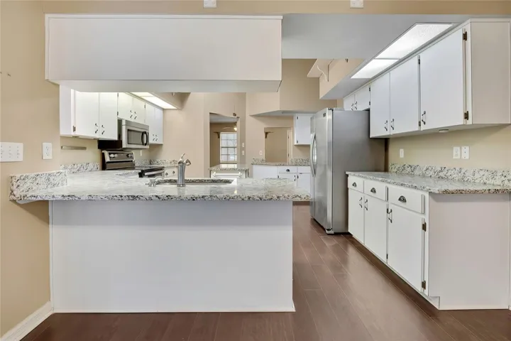 Kitchen pass-through and breakfast bar