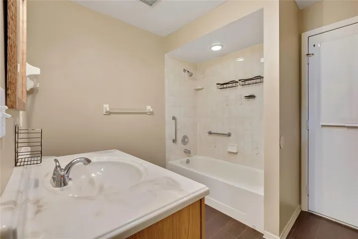 Full bathroom with tub-and-shower combination