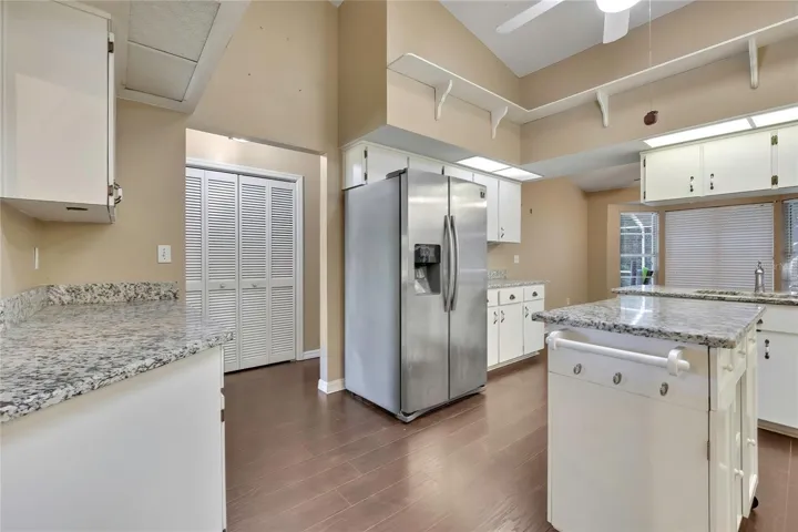 Kitchen with granite countertops and center island