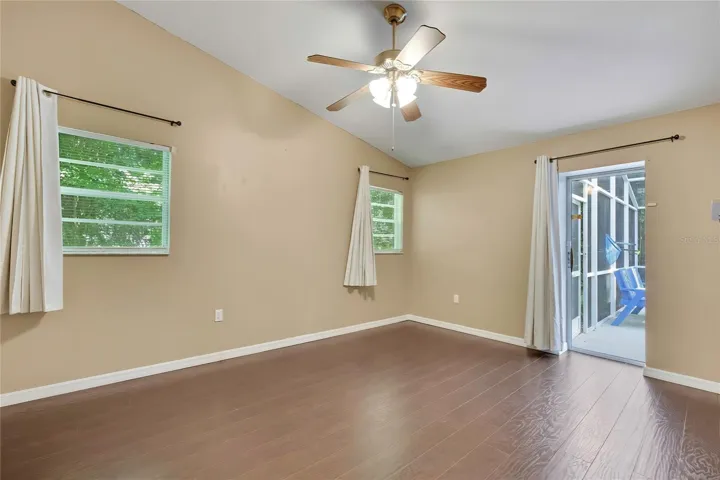 Bedroom with direct access to the screened outdoor area