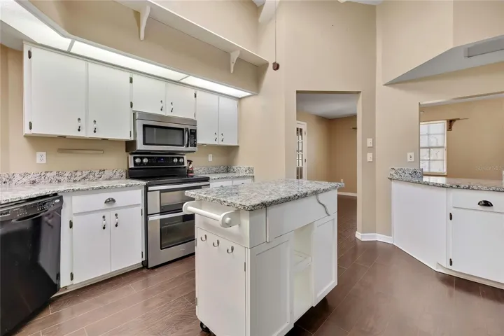 Kitchen with stainless-steel appliances and generous workspace