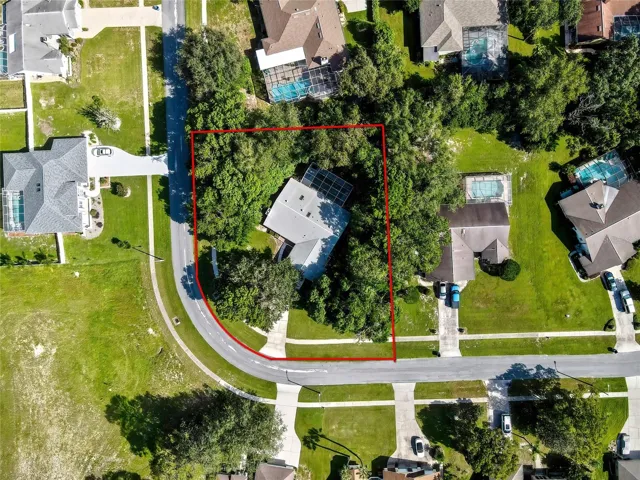 Overhead aerial with approximate property boundary shown