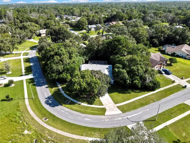 Aerial view highlighting the curved residential street