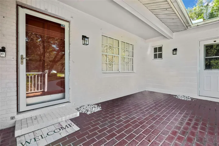 Covered brick-paver entry patio
