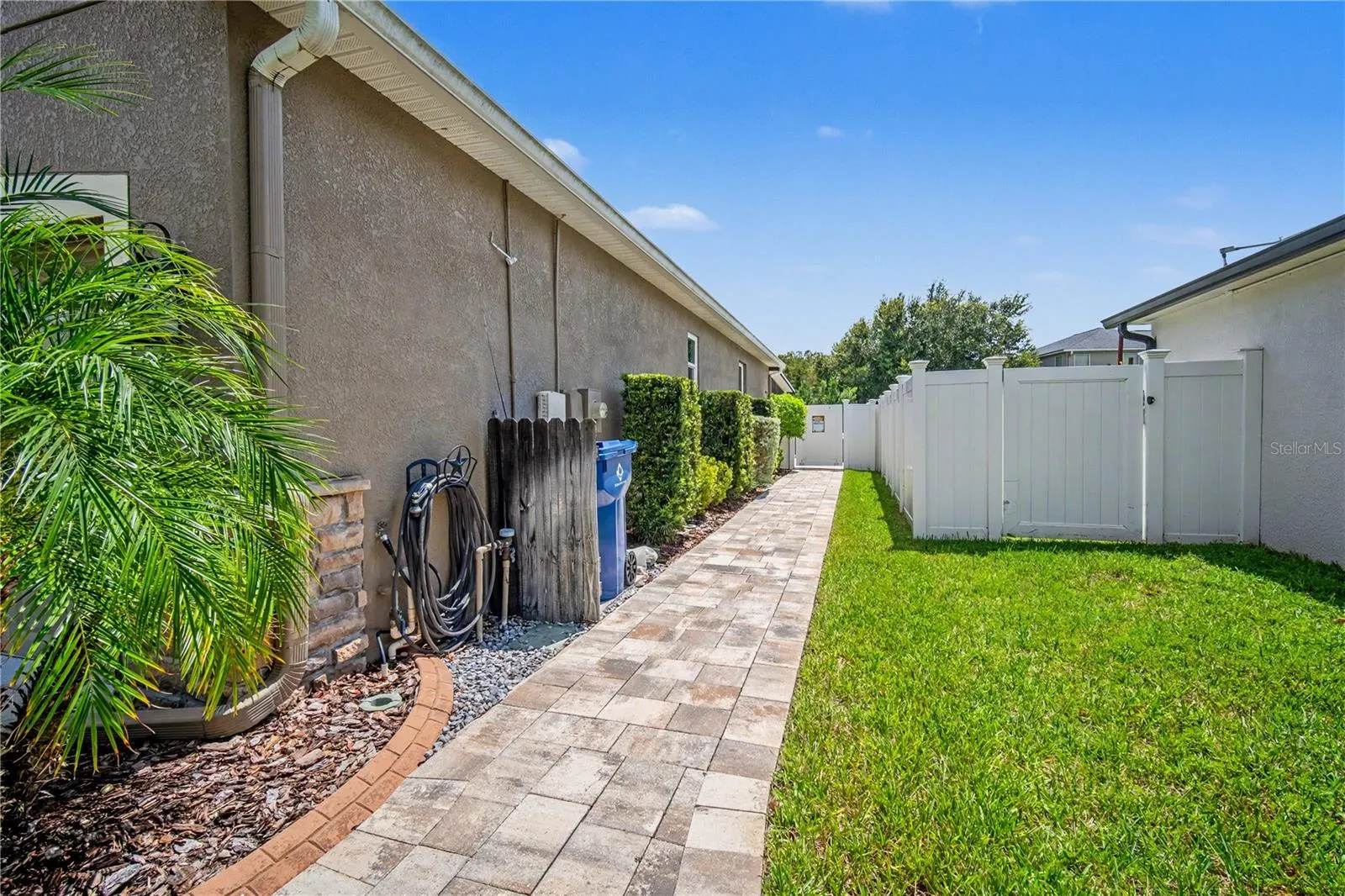 Fully Paved Southern Walkway Side Yard