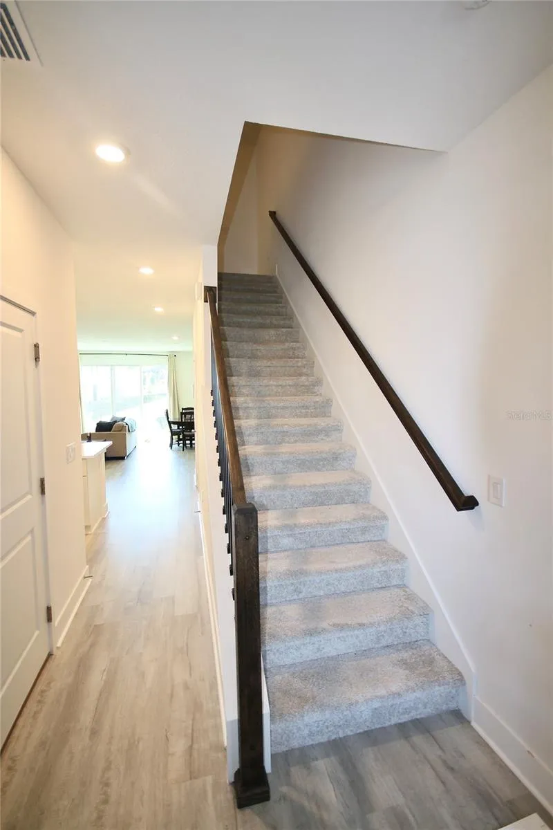 Stairs to upstairs loft and bedrooms