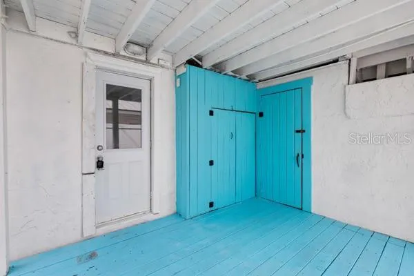 Unit 2 left side entrance and covered deck