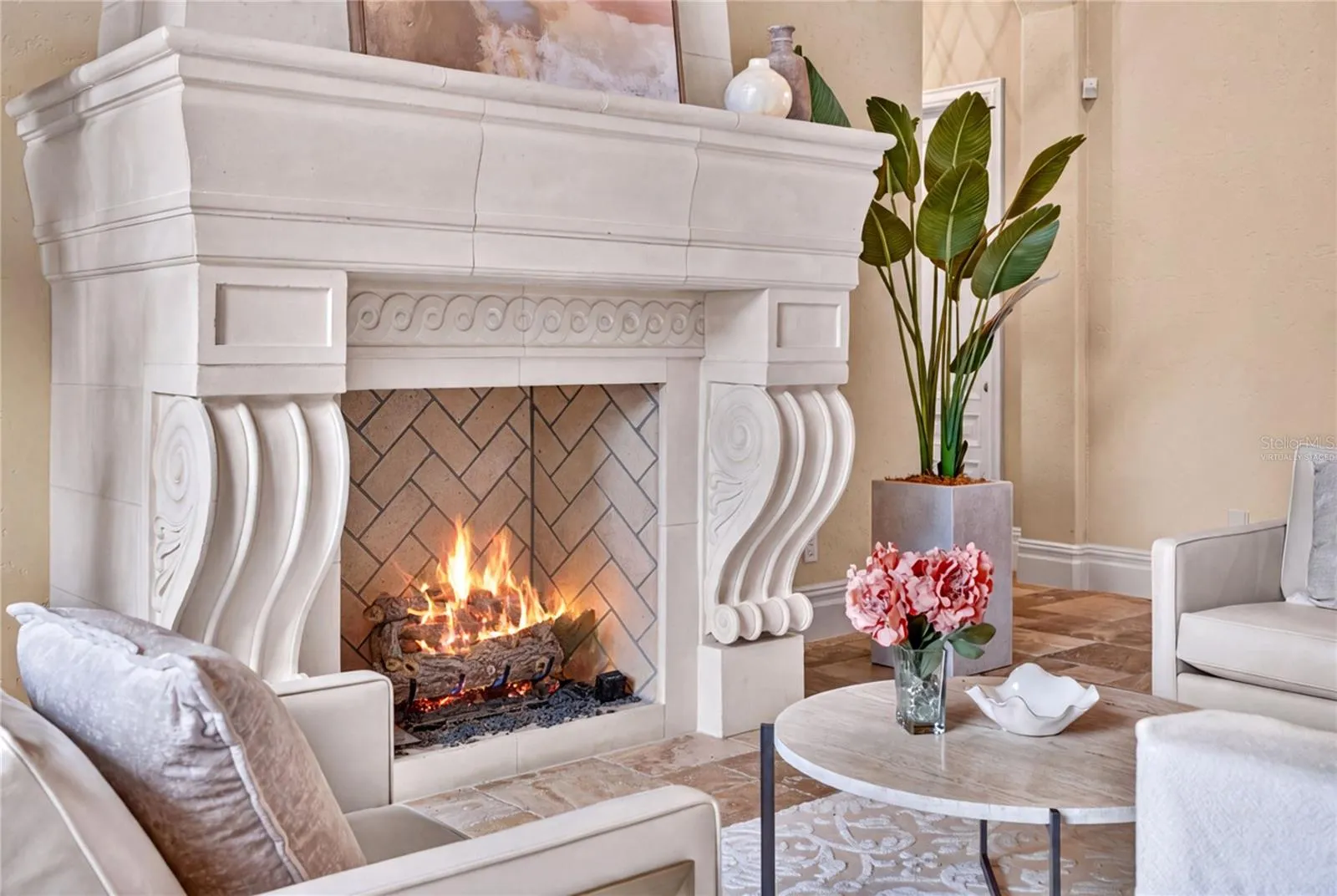 Virtually staged. The living room statement fireplace is natural gas.
