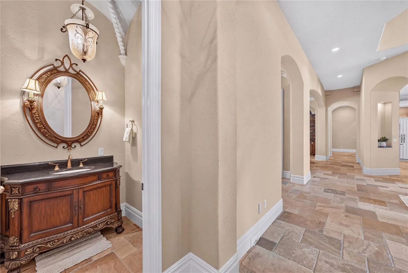 Guest Half Bath off the living room and office.