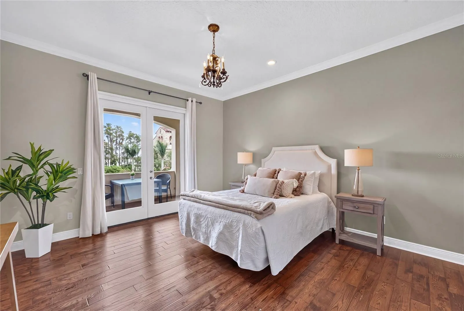 Upstairs Bedroom 7 offers ensuite bath and French Door access to Private BALCONY.