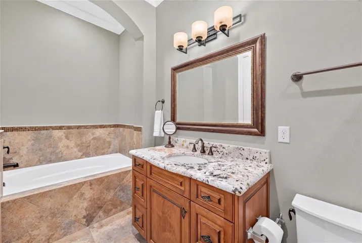 Bedroom 4 ensuite offers soaker tub and separate walk-in shower.