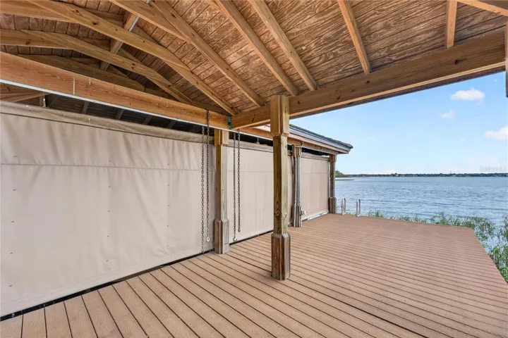 The 30'x12' Boat House can hold up to a 29' boat and has an NEW electric LIFT for up to 5500 lbs. and NEW remote cover. Underneath a Regal LS4 Fully Loaded boat with minimal hours and minimal usage is available for sale and negotiable.
