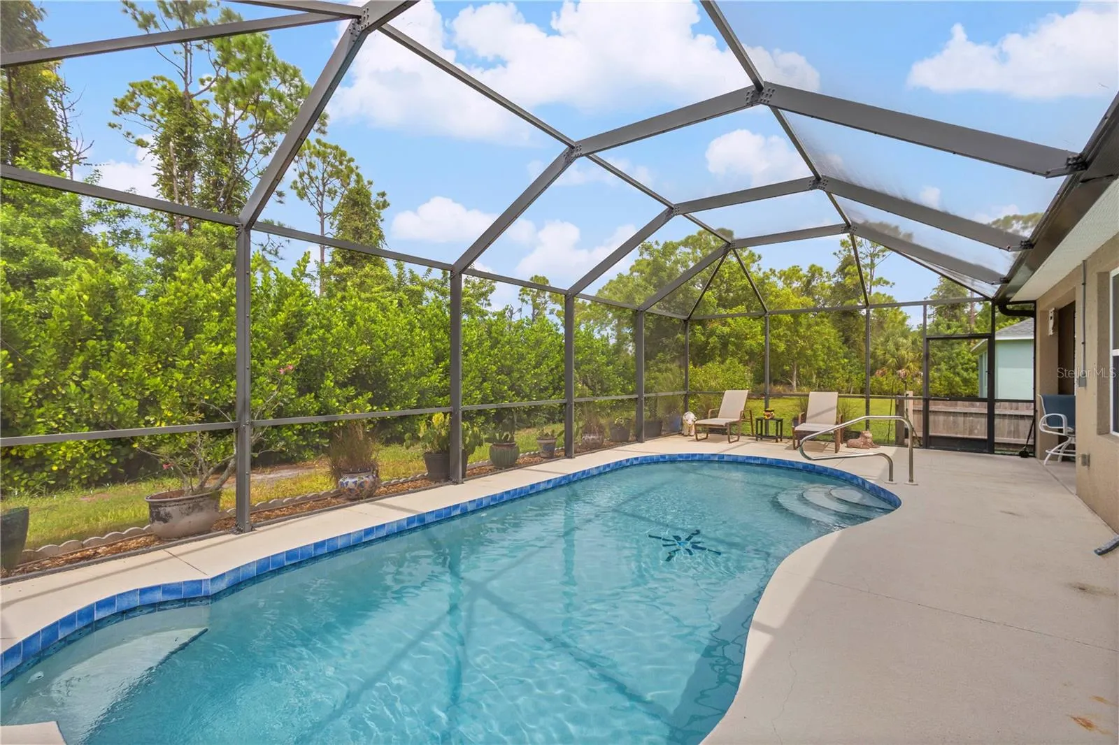 Sparkling heated pool to enjoy with privacy.