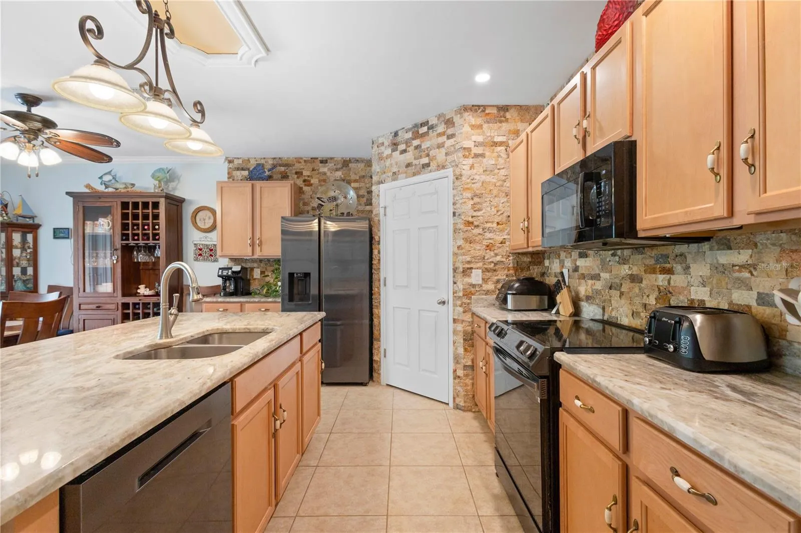 Large walk-in pantry and area for coffee bar.