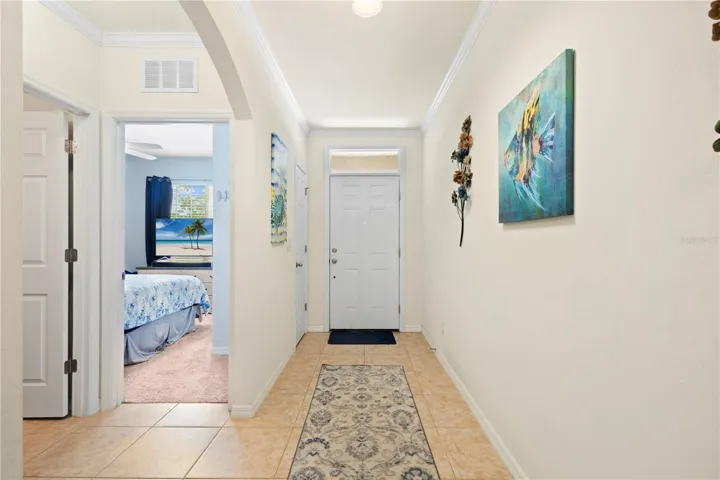 Nice entryway with Crown Molding and Baseboards.