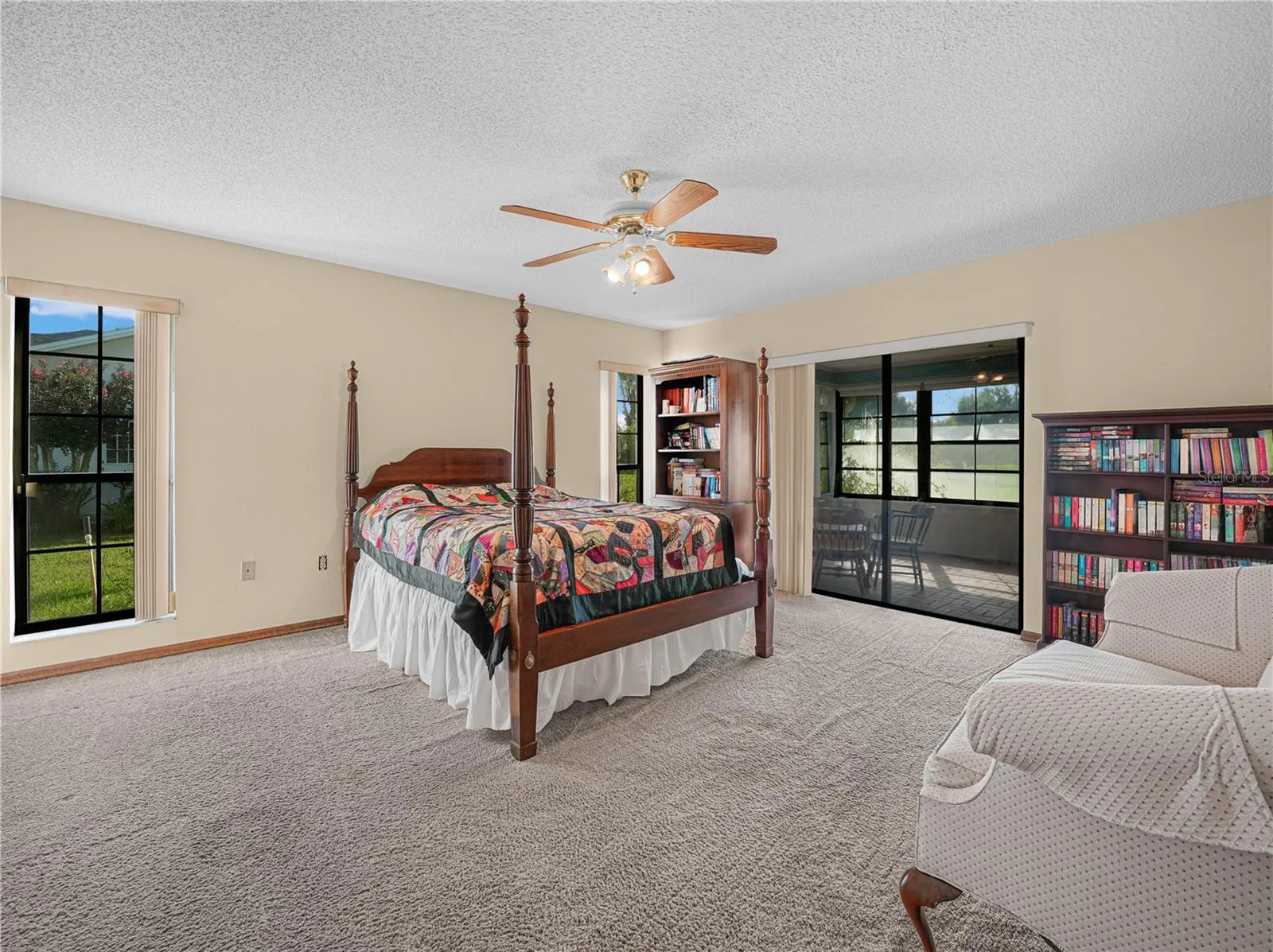 Main bedroom with sliding glass door to lanai.