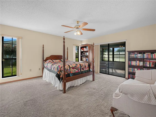 Main bedroom with sliding glass door to lanai.